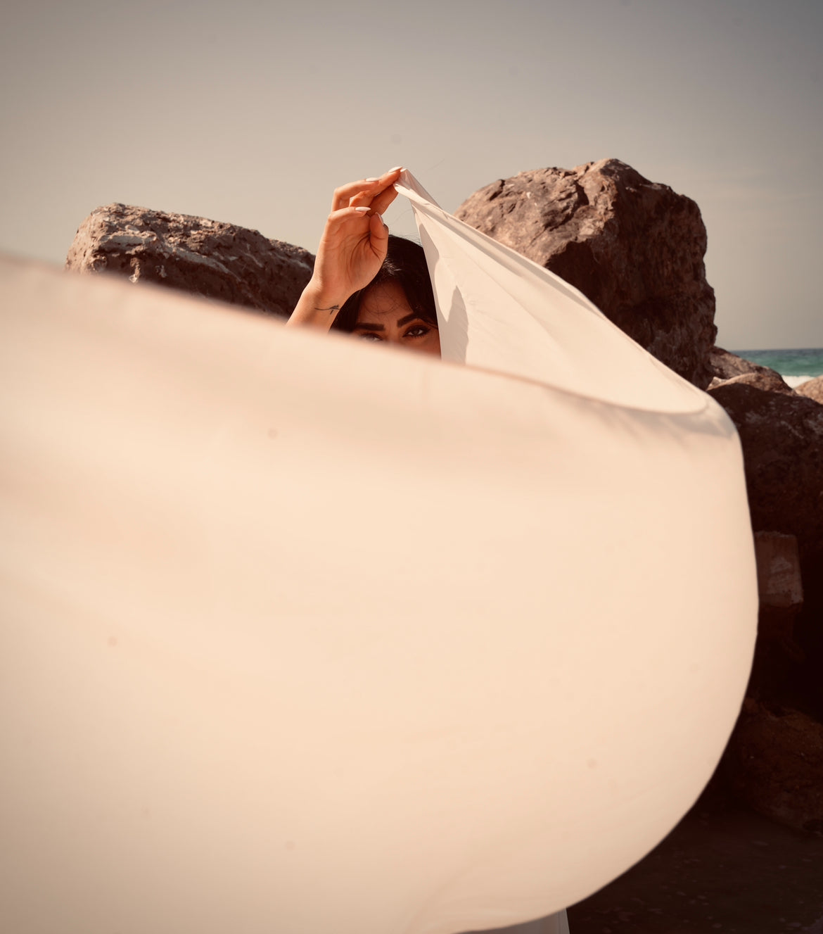 Model On Beach. Perfume Ad